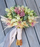 Unique Bridal Bouquet with Ribbon
Photography: Kiss Me in Paris
Read More:
http://www.insideweddings.com/weddings/ocean-view-ceremony-romantic-reception-with-chic-coastal-elements/1190/ wedding bouquet thistle protea unique bridal bouquet pink light pink ribbon wrapped stems