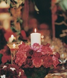Candlelit Reception Table
Photography: Miki and Sonja Photography
Read More:
http://www.insideweddings.com/weddings/a-passionate-golf-club-wedding-inspired-by-red-roses/72/ Mossy vase with red roses and white pillar candle