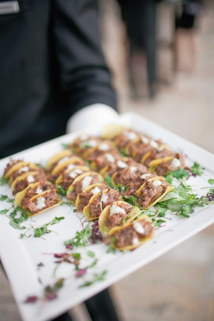 Pulled-Pork Tacos
Photography: Harwell Photography
Read More:
http://www.insideweddings.com/weddings/romantic-woodland-inspired-atlanta-wedding-with-natural-details/433/ Wedding appetizer with mini shaved pork tacos