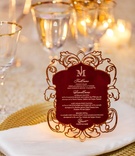 Laser-Cut Menu Card Details
Photography: Amy Anaiz Photography
Read More:
http://www.insideweddings.com/weddings/rooftop-ceremony-glam-reception-with-chic-blooms-in-new-york-city/1019/ Gold charger plate white napkin burgundy menu card elegant details