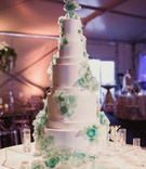 Chihuly-Inspired Cake
Photography: Shaun Menary Photography
Read More:
http://www.insideweddings.com/weddings/outdoor-elements-in-lavish-modern-wedding-of-childhood-sweethearts/802/ wedding cake with Chihuly-inspired sugar flowers turquoise blue green