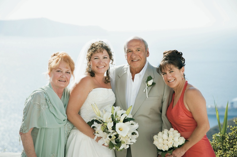 The Bride and Her Family
Photography: Mark Nixon Photographer
Read More:
http://www.insideweddings.com/weddings/destination-wedding-on-the-greek-island-of-santorini/207/ Mother-of-the-Bride dress and bridal party