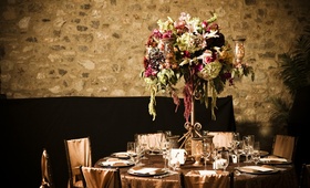 Tuscan-Inspired Reception Décor
Photography: Jared Platt Photography
Read More:
http://www.insideweddings.com/weddings/fall-wedding-with-european-inspired-charm-in-scottsdale-arizona/259/ Copper reception table and chairs with bohemian floral arrangement