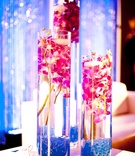 Submerged Floral Arrangement
Photography: Kim Fox Photography
Read More:
http://www.insideweddings.com/weddings/colorful-indian-summer-wedding-at-a-golf-course/449/ Cylindrical vases filled with pink orchids and candles
