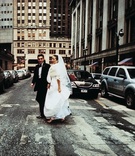 Couple in New York City
Photography: Cappy Hotchkiss Photography
Read More:
http://www.insideweddings.com/weddings/persian-chinese-wedding-celebration-in-new-york-city/130/ Bride and groom in wedding attire in the street