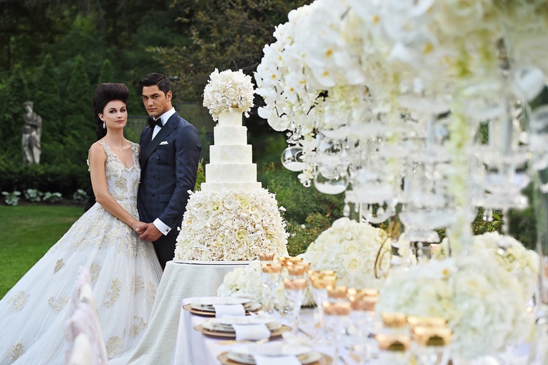 Bride and Groom Gaze at Décor
Photography: Carasco Photography
Read More:
http://www.insideweddings.com/weddings/styled-shoot-combines-old-world-charm-and-contemporary-fashion/849/ bride in ines di santo julia, groom in midnight blue tuxedo, look upon large cake, decorated table