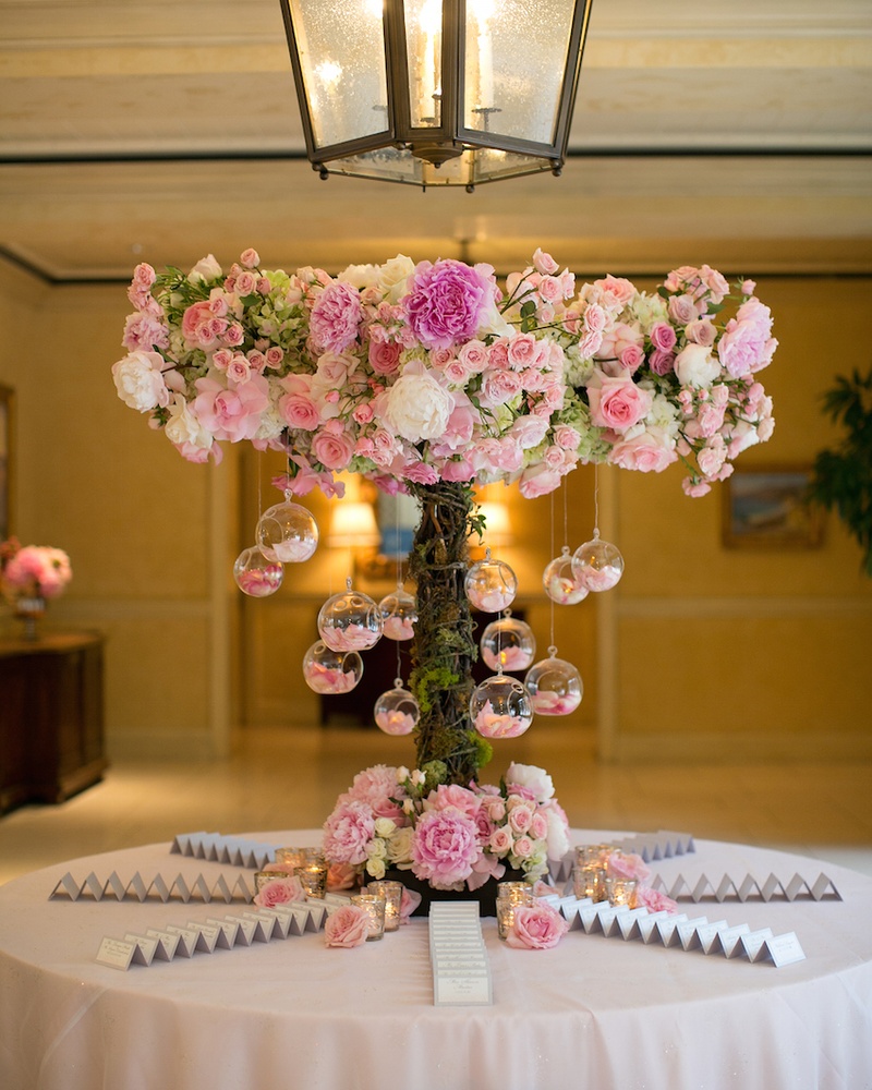 Pink %26 White Glass Orb Arrangement
Photography: Marianne Lozano Photography
Read More:
http://www.insideweddings.com/weddings/pink-white-wedding-with-ombre-details-at-montage-laguna-beach/686/ Escort card table with terrarium and pink peony rose decorations