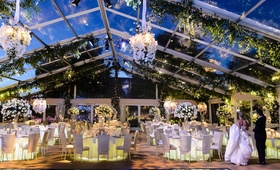 A-Line Transparent Tent
Photography: Chrisman Studios
Read More:
http://www.insideweddings.com/weddings/impressive-colorado-wedding-over-an-olympic-sized-pool/566/ Bride and groom seeing plexiglas reception venue for first time