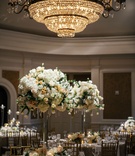 Exquisite Chandelier Over Tall Flowers
Photography: Chris Bailey Photography
Read More:
http://www.insideweddings.com/weddings/sophisticated-southern-soiree-in-texas-with-an-ode-to-new-orleans/1093/ Tall centerpieces white and peach blush flowers round arrangement crystal chandelier round tables