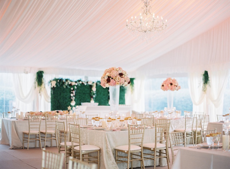 Glam Tented Wedding with Hedge Wall
Photography: Lauren Gabrielle Photography
Read More:
http://www.insideweddings.com/weddings/lovely-country-club-summer-wedding-with-tent-reception-in-ohio/1018/ Wedding reception green hedge wall flowers tall centerpieces gold chairs reception decor ideas