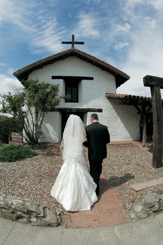 Wedding at Mission San Francisco Solano
Photography: Sherman Chu Photographer
Read More:
http://www.insideweddings.com/weddings/elegant-garden-style-vineyard-wedding-in-sonoma-california/205/ Father of bride walks bride to the entrance of Mission San Francisco Solano