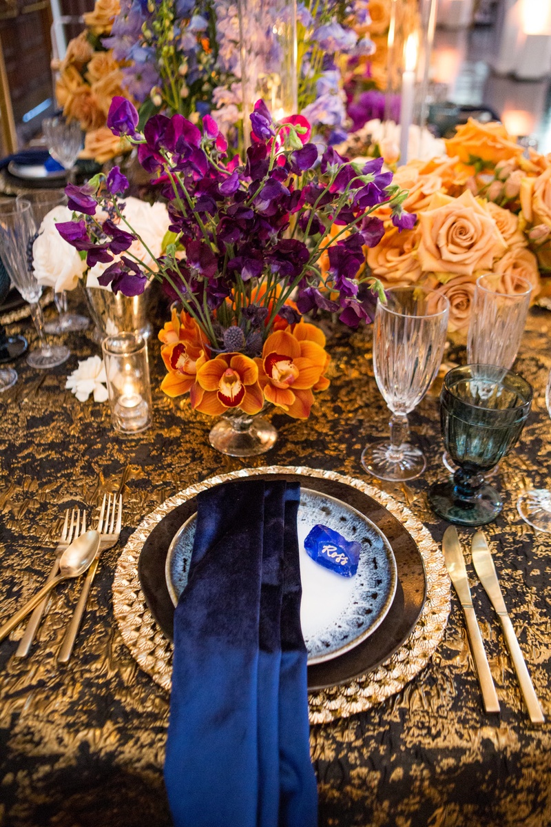 Navy, Silk Napkin
Photography: Duke Photography
Read More:
http://www.insideweddings.com/weddings/dramatic-tablescape-at-launch-party-for-luxe-linens-newest-line/987/ silk navy linens, black and gold table setting, black and gold linens