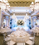 White Flowers %26 Greenery on Crystal Stand
Photography: Eli Turner Studios
Read More:
http://www.insideweddings.com/weddings/elegant-and-romantic-jewish-ballroom-wedding-in-washington-dc/1109/ reception centerpiece with white peonies and hydrangeas with soft greenery on tall crystal stansd
