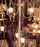 Crystal Wedding Centerpiece
Photography: Images by Berit, Inc.
Read More:
http://www.insideweddings.com/weddings/luxurious-summer-wedding-at-the-pierre-new-york/378/ Close up photo of crystal strands and candles on centerpiece