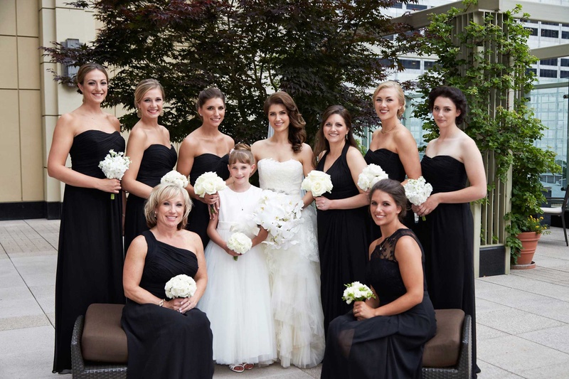 Bride and Bridesmaids in Black Dresses with Bouquets
Photography: KingenSmith
Read More:
http://www.insideweddings.com/weddings/delicately-detailed-chicago-wedding-with-jewish-christian-customs/762/ bride and bridesmaids in black dresses with white orchid bouquets flower girl in white dress