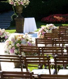 Garden Ceremony Décor
Photography: Simone %26 Martin Photography
Read More:
http://www.insideweddings.com/weddings/destination-wedding-at-luxury-lake-como-hotel/386/ Wood chairs with neutral-toned flower arrangements
