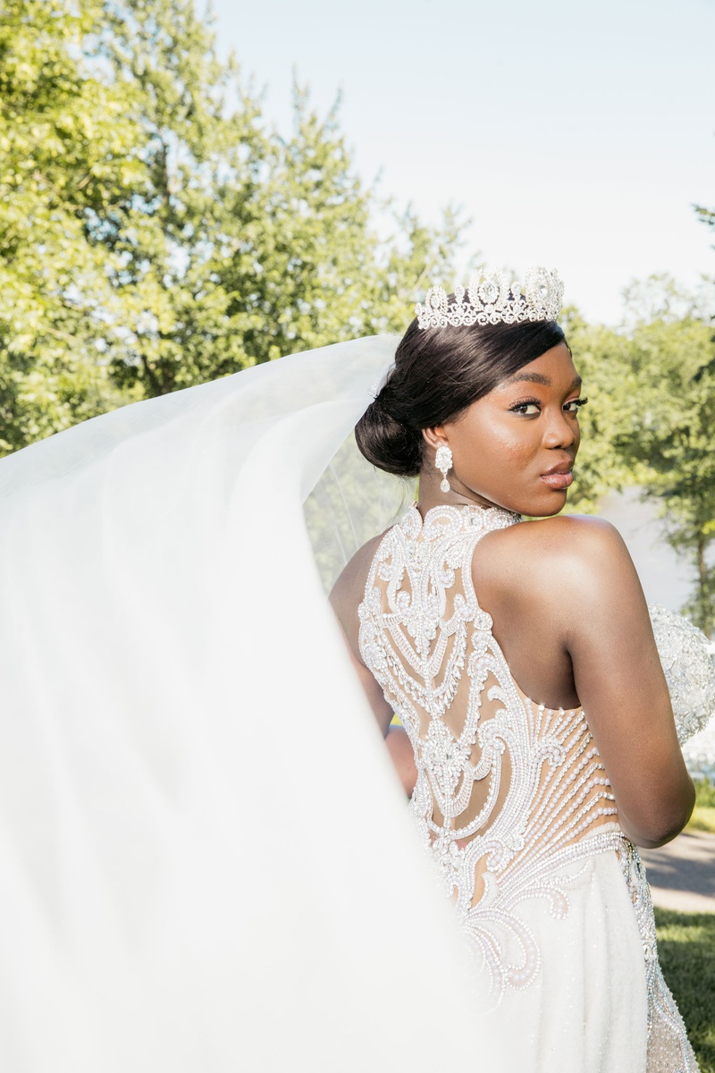Bride in Couture Gown and Tiara
Photography: Brian Bossany Photography
Read More:
http://www.insideweddings.com/weddings/luxurious-heaven-inspired-royal-wedding-celebration-in-minneapolis/1333/ bride ghana african royalty in jewel beaded gown couture veil updo earrings tiara headpiece
