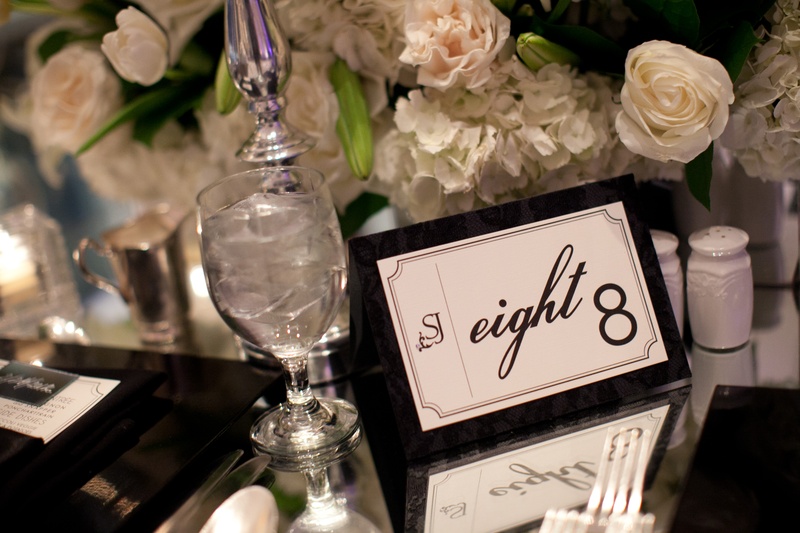 Black-and-White Table Number
Photography: Collins Metu Photography
Read More:
http://www.insideweddings.com/weddings/sarita-minor-and-jarett-dillard/432/ Monogram and table number written out on white stationery