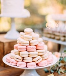 French Macaron Desserts on Cake Stand
Photography: Ashley Paige Photography
Read More:
http://www.insideweddings.com/weddings/elegant-outdoor-fall-wedding-at-a-rustic-chic-venue-in-malibu/1244/ wedding reception dessert table white cake stand with pink white macaron desserts