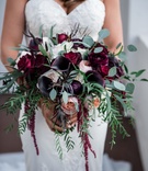Dark-Colored Bridal Bouquet
Photography: Kim Fox Photography
Read More:
http://www.insideweddings.com/weddings/luxe-vintage-inspired-winter-wedding-in-downtown-los-angeles/1082/ Bride in sweetheart neckline wedding dress holding dark burgundy bouquet greenery freshly picked