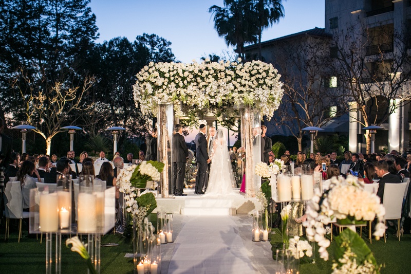 Alfresco Jewish Ceremony After Sunset
Photography: Samuel Lippke Studios
Read More:
http://www.insideweddings.com/weddings/outdoor-jewish-wedding-ceremony-luxe-reception-in-california/1160/ wedding ceremony after sunset jewish tradition birch branch candles white flowers greenery