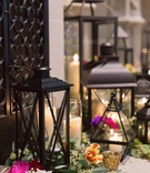 Black Lanterns, Greenery, Colorful Blossoms
Photography: Amanda Donaho Photography
Read More:
http://www.insideweddings.com/weddings/indoor-wedding-with-cultural-and-floral-elements-in-dayton-ohio/972/ black lanterns greenery colorful blossoms ceremony altar decor vintage art institute of dayton ohio