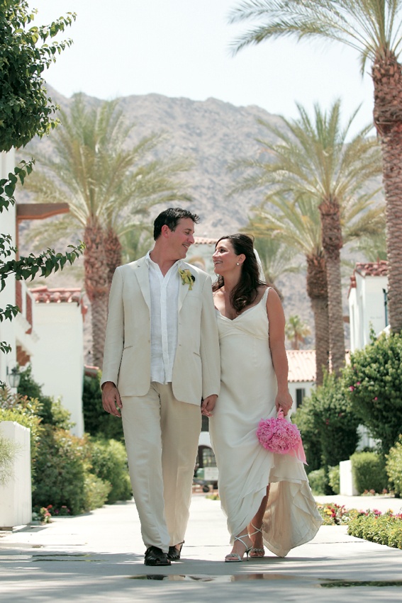 Desert Wedding Attire
Photography: Asgeir Bollason for David Michael Photography
Read More:
http://www.insideweddings.com/weddings/pink-green-memorial-day-weekend-wedding-in-palm-desert/128/ Mary Dann and groom walking through resort
