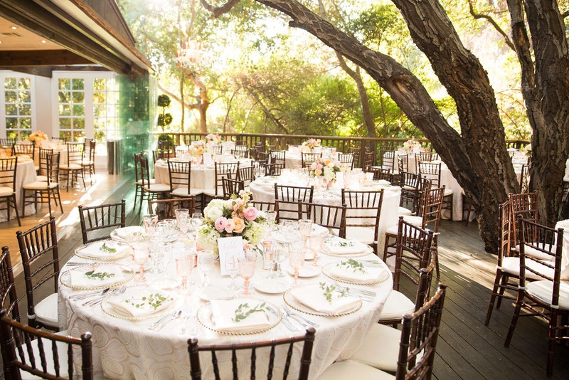 Rustic Setting for Alfresco Reception
Photography: Ashley Paige Photography
Read More:
http://www.insideweddings.com/weddings/elegant-outdoor-fall-wedding-at-a-rustic-chic-venue-in-malibu/1244/ wedding reception outdoor tables light color palette low centerpieces roses wood chairs greenery