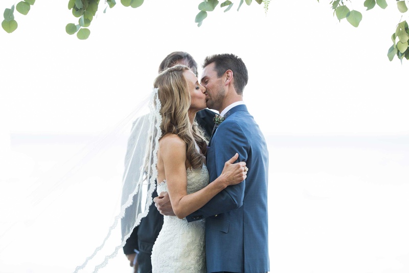First Kiss as Husband and Wife
Photography: Sallee Photography
Read More:
http://www.insideweddings.com/weddings/rustic-chic-lakeside-wedding-with-geometric-details-in-california/843/ bride in pronovias and groom in ken baker kiss after being pronounced husband and wife