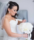 Bride with Sparkling Accessories
Photography: Sakosan Photography
Read More:
http://www.insideweddings.com/weddings/armenian-wedding-with-church-ceremony-blush-white-reception/809/ Armenian bride with flower headpiece, bracelet, white peony bouquet with ribbon, teardrop earrings