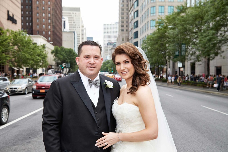 Couple Embraces in Chicago Street
Photography: KingenSmith
Read More:
http://www.insideweddings.com/weddings/delicately-detailed-chicago-wedding-with-jewish-christian-customs/762/ bride and groom embrace in chicago on a busy street