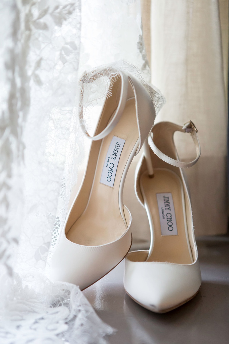 White Heels with Ankle Strap
Photography: Maya Myers Photography
Read More:
http://www.insideweddings.com/weddings/classic-traditional-ceremony-striking-reception-in-new-york-city/1340/ jimmy choo pumps ankle strap white heels designer