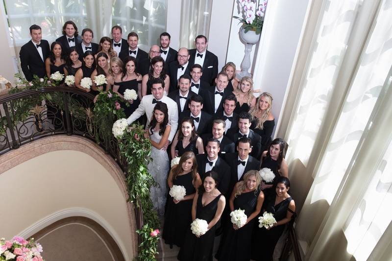 Wedding Party from Above
Photography: Jay Lawrence Goldman Photography
Read More:
http://www.insideweddings.com/weddings/outdoor-ceremony-ballroom-reception-with-pink-flowers-greenery/1135/ Wedding party on staircase at beverly hills hotel tuxedos and black dresses mismatched necklines