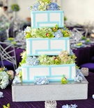 Square Wedding Cake
Photography: Hoffmann Photographer
Read More:
http://www.insideweddings.com/weddings/colorful-summer-wedding-at-st-regis-monarch-beach/361/ Geometric cake design topped with fresh flowers
