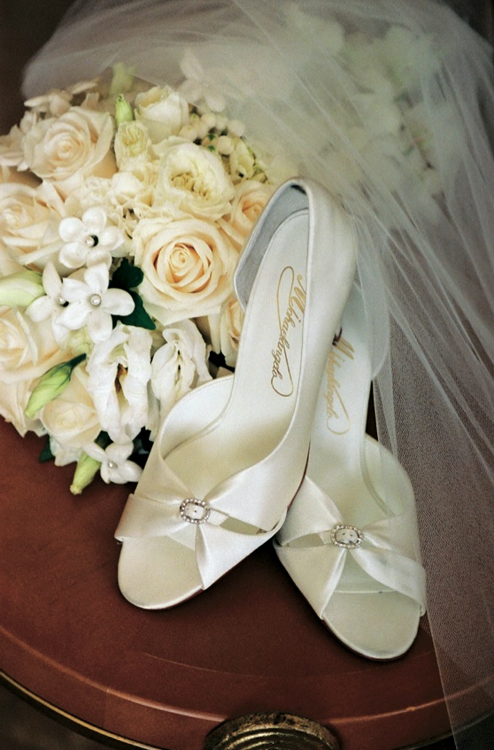 Ivory Peep-Toe Wedding Heels
Photography: John Solano Photography
Read More:
http://www.insideweddings.com/weddings/timeless-ceremony-ballroom-reception-at-the-beverly-hills-hotel/208/ White satin wedding shoes with rhinestones