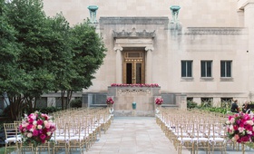 Outdoor Ceremony with Pink Flowers
Photography: Amanda Donaho Photography
Read More:
http://www.insideweddings.com/weddings/black-and-white-museum-wedding-with-pops-of-bright-pink/1228/ cincinnati art museum wedding with gold chiavari chairs and light and dark pink flower arrangements