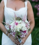 Natural Garden Bouquet
Photography: Sarah Tew Photography
Read More:
http://www.insideweddings.com/weddings/garden-chic-summer-wedding-in-brooklyn/510/ Bride holding white and pink bouquet with foliage