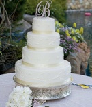 Round White Wedding Cake
Photography: Melissa Musgrove Photography
Read More:
http://www.insideweddings.com/weddings/isabelle-bridges-and-brandon-boesch/234/ Four layer cake with embroidered details