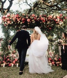 Bride %26 Groom at Outdoor Chuppah
Photography: Joseph West Photography
Read More:
http://www.insideweddings.com/weddings/childhood-friends-say-i-do-at-garden-inspired-wedding-in-austin/1338/ wedding ceremony jewish outdoor greenery pink coral orange flowers guests in wood chairs