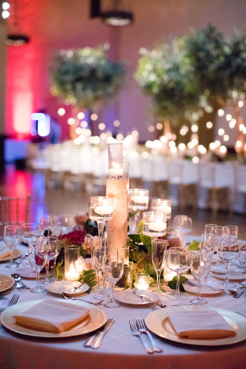 Centerpiece of Candles and Birch Trunk
Photography: Acqua Photo
Read More:
http://www.insideweddings.com/weddings/balboa-park-wedding-with-wine-inspired-color-scheme-in-san-diego/948/ wedding reception centerpiece birch branch, candles, moss,