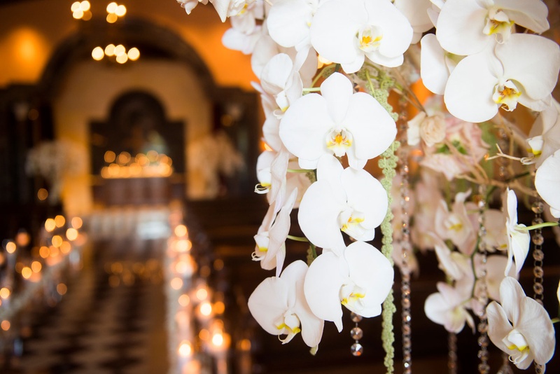Floral Arrangement Details at Ceremony
Photography: Boyd Harris Photographs
Read More:
http://www.insideweddings.com/weddings/a-jeweled-floral-wedding-at-fairmont-grand-del-mar-in-san-diego/745/ Close-up of orchid and jewel floral arrangements at Grand Del Mar wedding ceremony