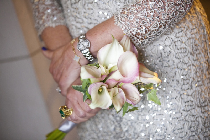 Mother's Calla Lily Bouquet
Photography: Images by Berit, Inc.
Read More:
http://www.insideweddings.com/weddings/wedding-with-purple-modern-details-at-a-chateau-in-new-jersey/693/ Mother of the bride at wedding in a long-sleeve sequined dress holds white calla lily bouquet