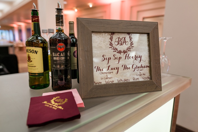 Wood Bar Sign with Sip Sip Hooray
Photography: Kent Drake Photography
Read More:
http://www.insideweddings.com/weddings/an-event-planners-wedding-at-a-museum-by-sue-the-tyrannosaurus-rex/955/ Wood sign at bar for wedding signature drinks custom personalized napkins