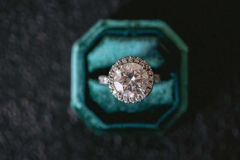 Round Diamond Halo Engagement Ring
Photography: Maya Myers Photography
Read More:
http://www.insideweddings.com/weddings/candlelit-jewish-ceremony-unique-cozy-outdoor-reception-in-la/1346/ wedding ring engagement ring in velvet teal ring box large round diamond halo setting