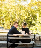 Bride %26 Groom on Park Bench
Photography: Images by Berit, Inc.
Read More:
http://www.insideweddings.com/weddings/bride-wears-little-black-dress-to-intimate-wedding-in-new-york-city/734/ Bride in a black off-the-shoulder Oscar de la Renta dress sits with groom in blue suit on a bench