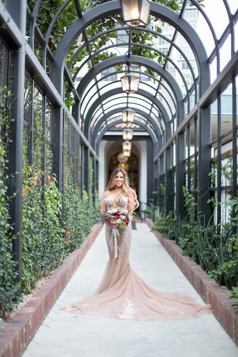 Bride in Blush Gown with Fall Bouquet
Photography: Maya Myers Photography
Read More:
http://www.insideweddings.com/weddings/candlelit-jewish-ceremony-unique-cozy-outdoor-reception-in-la/1346/ bride in blush champagne inbal dror wedding dress long hair highlights fall bouquet burgundy flowers