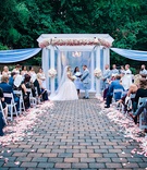 Ashley Alexiss' Wedding Ceremony
Photography: Brian Jarreau Photography
Read More:
http://www.insideweddings.com/weddings/alfresco-ceremony-fairy-tale-wedding-reception-with-lavish-decor/1227/ wedding ceremony courtyard brick aisle white pink flower petals drapery arch arbor pink flowers