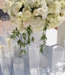 Ceremony Aisle Arrangement
Photography: Kris Kan
Read More:
http://www.insideweddings.com/weddings/joanna-krupa-and-romain-zago/515/ White flower arrangements at Joanna Krupa's wedding ceremony