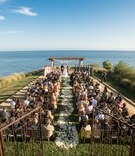 Oceanfront Bluff Ceremony
Photography: Studio EMP
Read More:
http://www.insideweddings.com/weddings/oceanfront-santa-barbara-wedding-with-romantic-color-palette/463/ Grass lawn ceremony with ocean views and gated entry