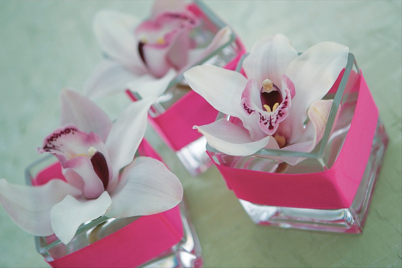 Pink Orchid Display
Photography: Asgeir Bollason for David Michael Photography
Read More:
http://www.insideweddings.com/weddings/pink-green-memorial-day-weekend-wedding-in-palm-desert/128/ Rectangular vessel holding light purple orchid blossom